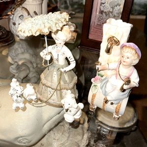 Two porcelain figures, Lady with poodle dogs and boy !